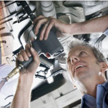 mechanic repairing a car